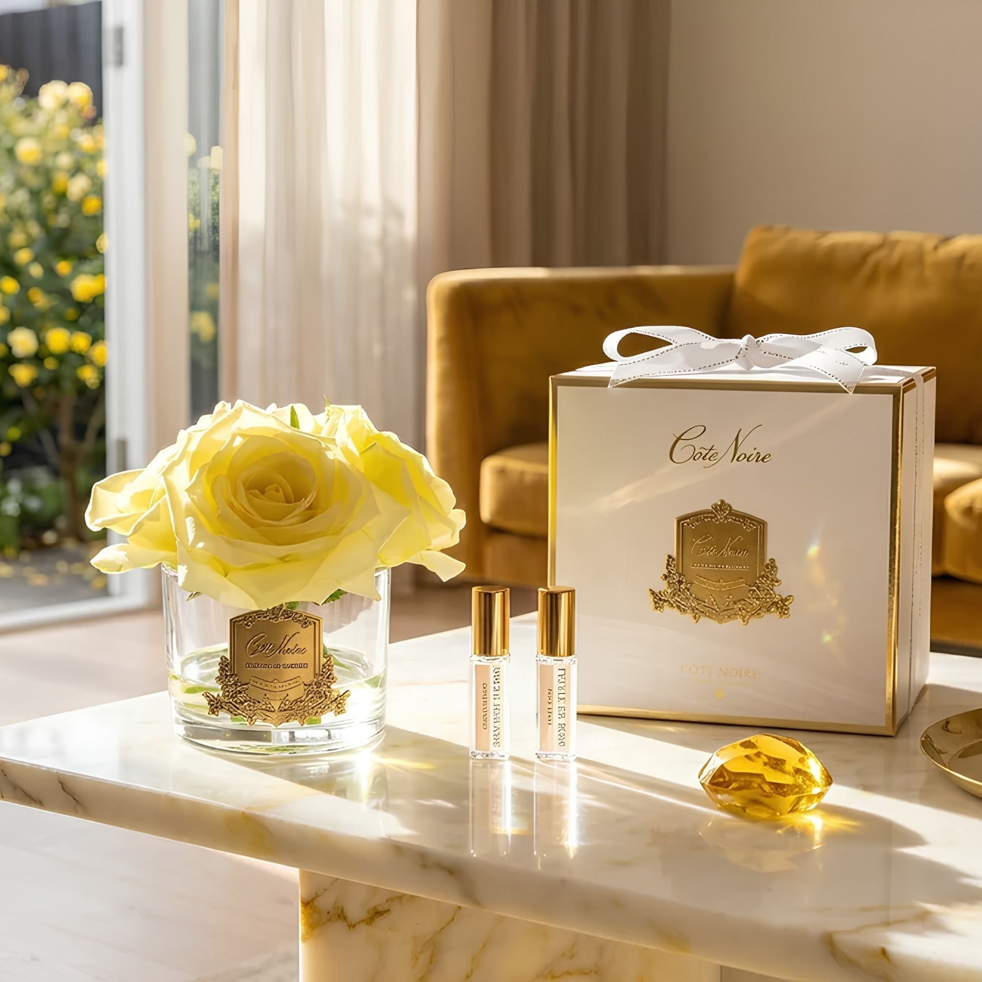 Close-up of Côte Noire Yellow Five Roses petals in gel with silver badge detail