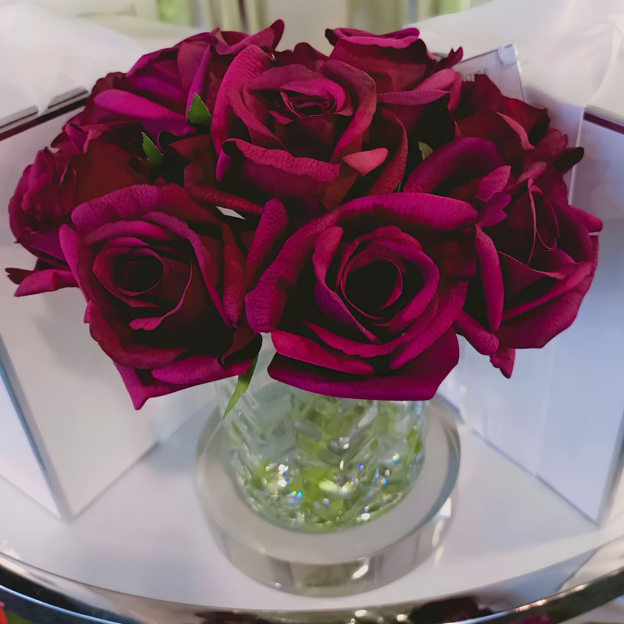 Close-up of Côte Noire Carmine Red Herringbone Rose Buds petals in gel
