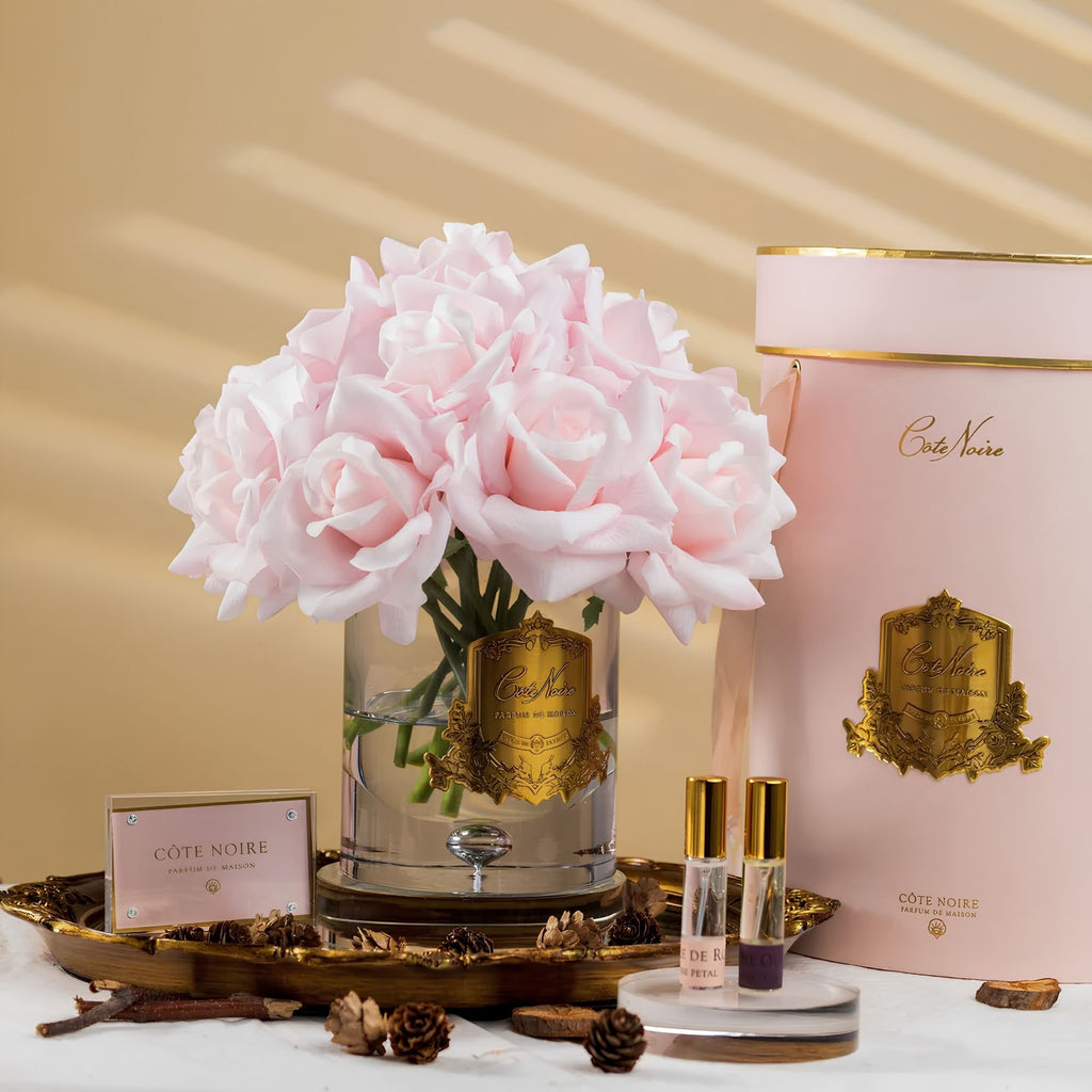 Close-up of Côte Noire Luxury Grand Bouquet French Pink roses in clear gel with gold badge detail