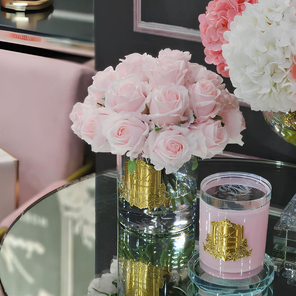Close-up of Côte Noire Luxury Grand Rose Bud Bouquet French Pink rose buds in clear gel with gold badge detail