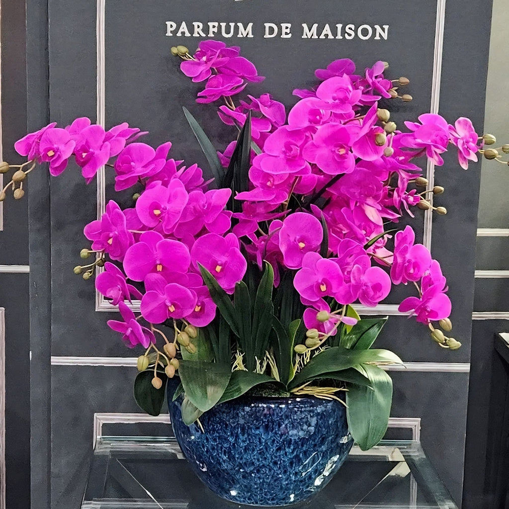 Côte Noire Luxury Orchid G009 in ceramic pot with two perfume bottles