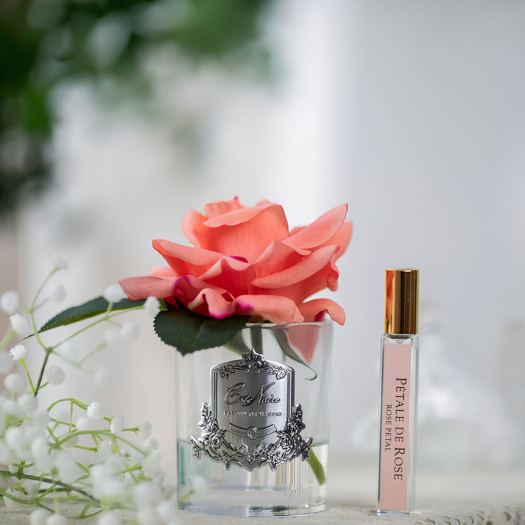 Close-up of Côte Noire Single French Rose peach petals in gel inside clear glass