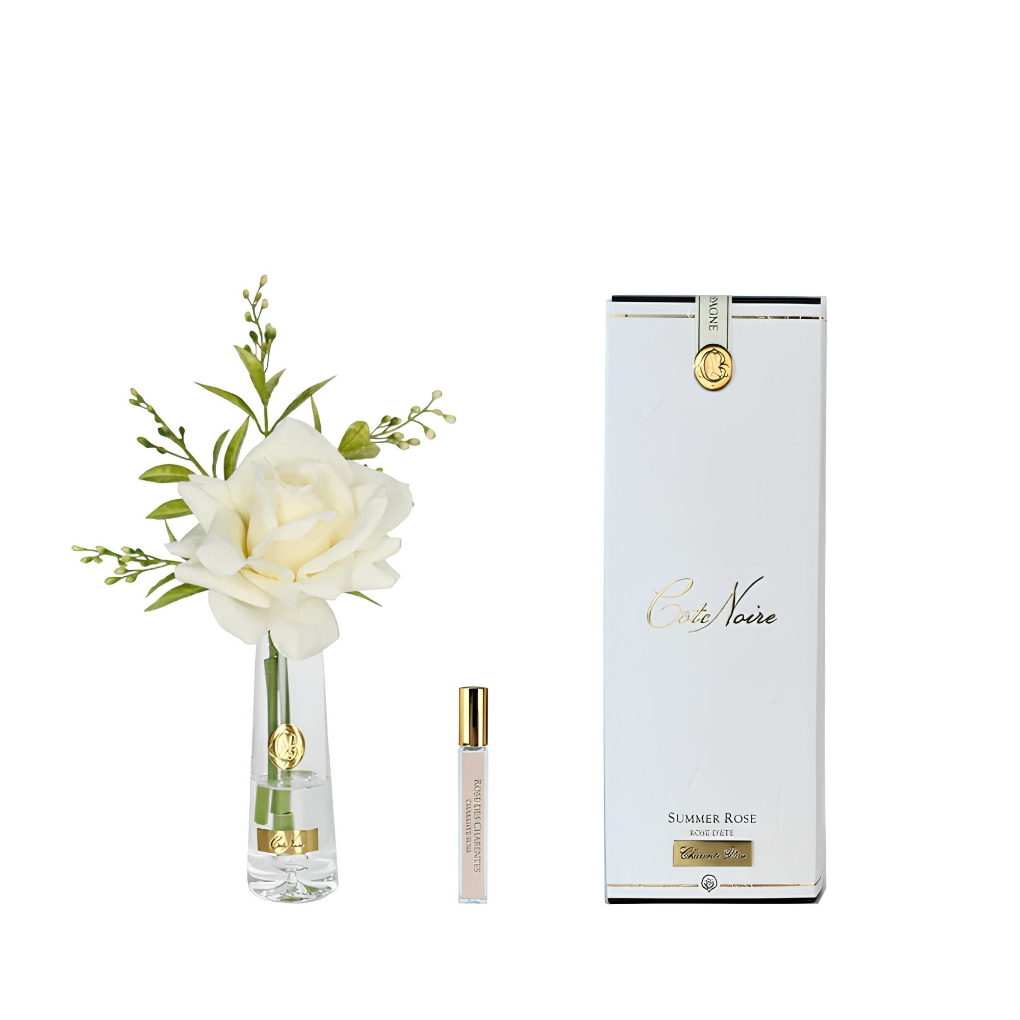 Côte Noire Champagne Summer Rose in clear vase with gold badge