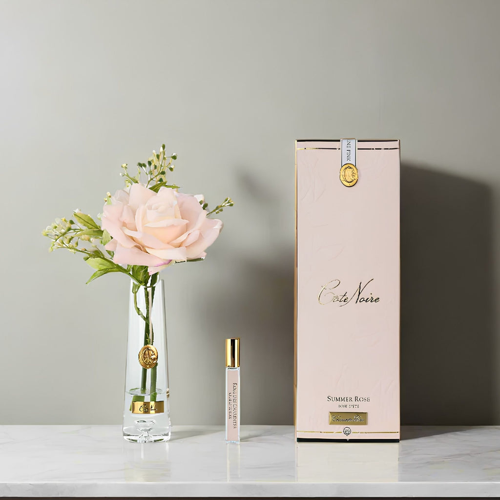 Close-up of Côte Noire Champagne Pink Summer Rose petals in gel with gold badge detail