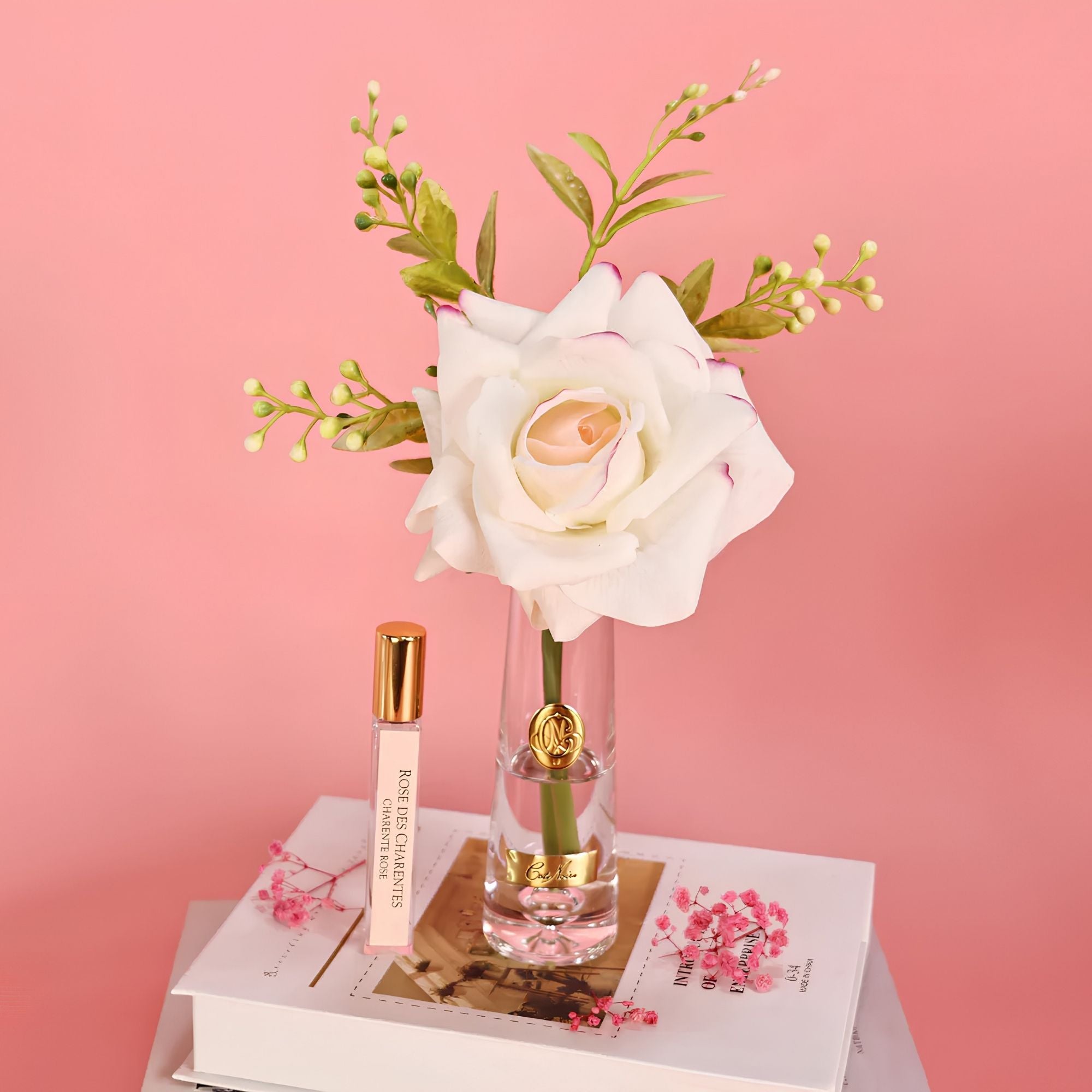 Close-up of Côte Noire Pink Blush Summer Rose petals in gel with gold badge detail