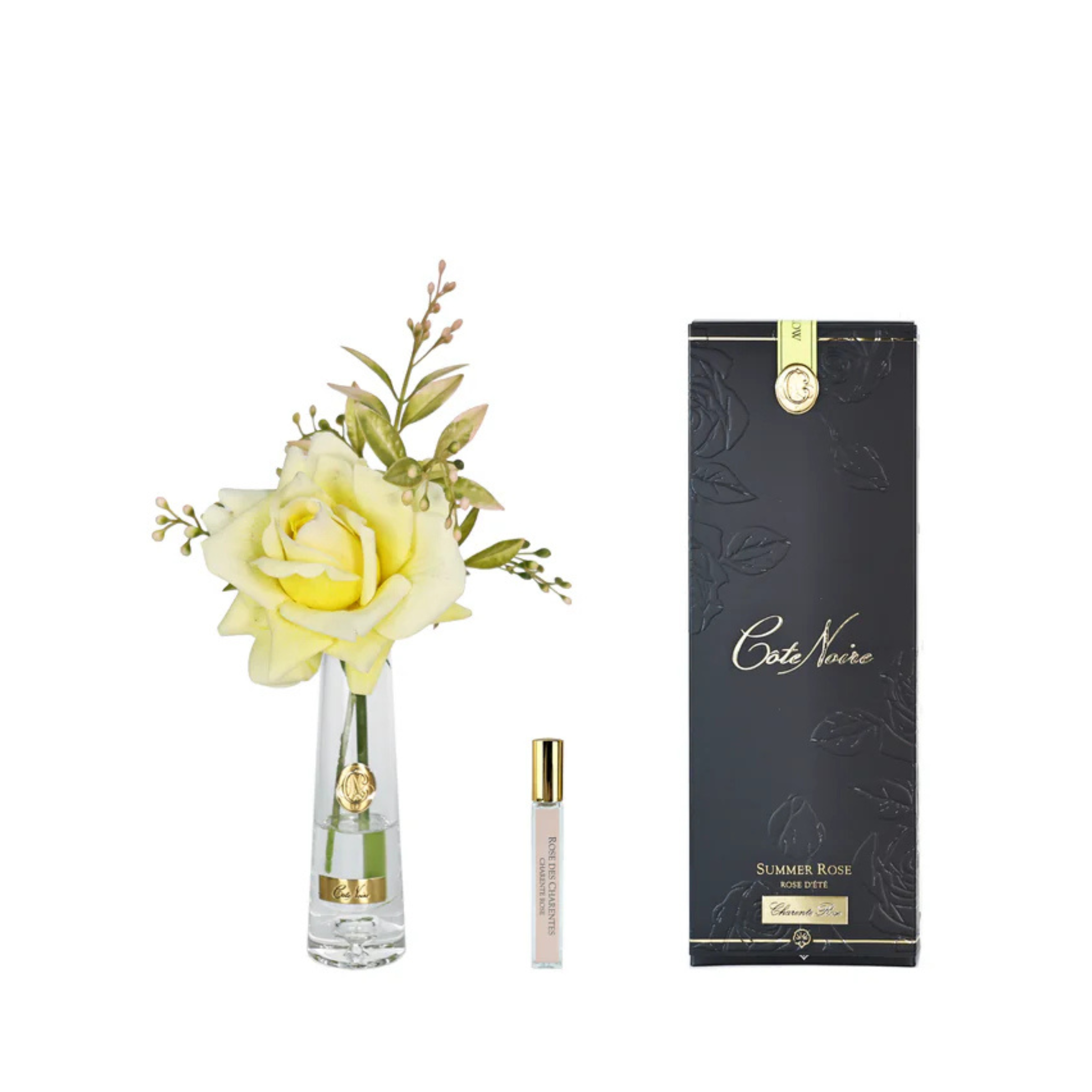 Côte Noire Summer Rose Yellow in clear vase with gold badge
