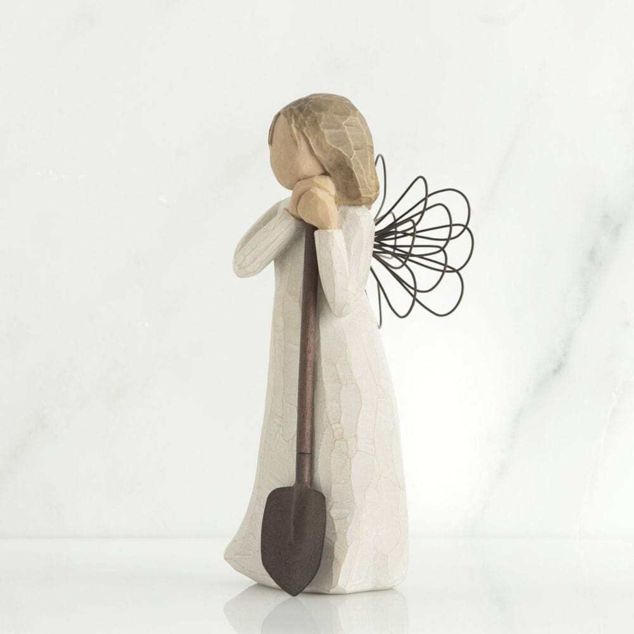Close-up of Willow Tree Angel of the Garden figurine hand-painted detail